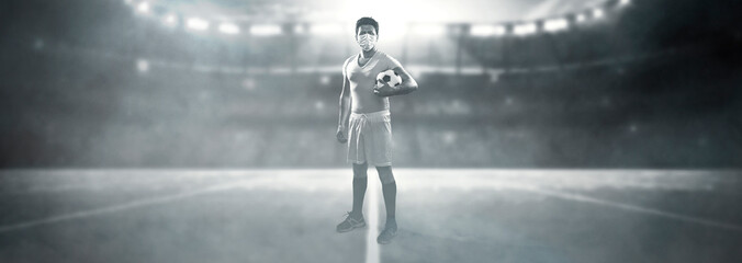 Footballer wearing mask to prevent Virus. Stop the game of football.