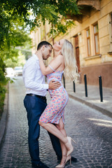 Fototapeta premium Smiling couple in love outdoors, lviv. summer