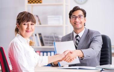 Fototapeta premium Man and woman discussing in office