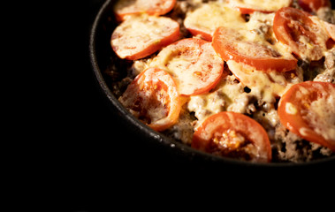 Homemade Moussaka in a pan. Greek cuisine. Side view.
