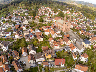 Fototapeta na wymiar Aerial view of Forbach village and Black forest trees