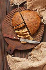 Fresh homemade rye loaf of bread, rustic style