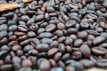 Coffee Beans over Wood Background
