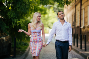 Obraz premium Beautiful couple in love dating outdoors and smiling