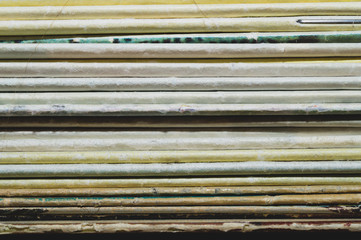 Stack of old magazines. heap of retro newspapers. vintage journals lie on top of each other
