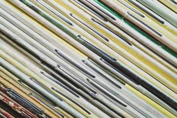 Stack of old magazines. heap of retro newspapers. vintage journals lie on top of each other