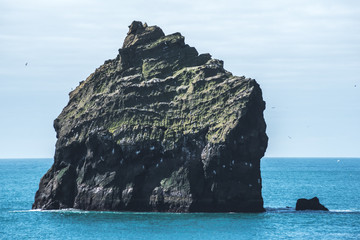 Rock in the ocean © AristilisPhotography