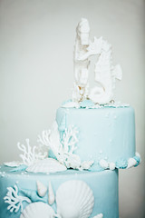 Fototapeta na wymiar wedding cake with a Morse theme