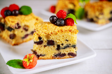 Blueberry coffee cake cut into squares.