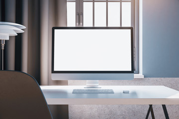 Minimalistic office and computer with empty screen