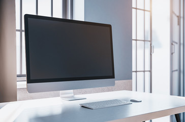 Fototapeta premium Modern office and empty black computer screen