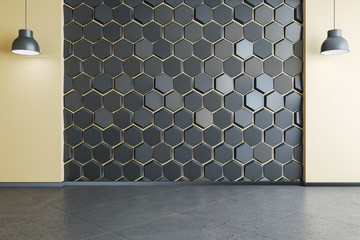 Gallery interior with blank honeycomb wall.