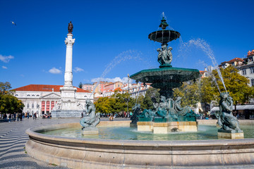 Fototapeta na wymiar Fountain on the main square in Lisbon, Portugal, February 2018