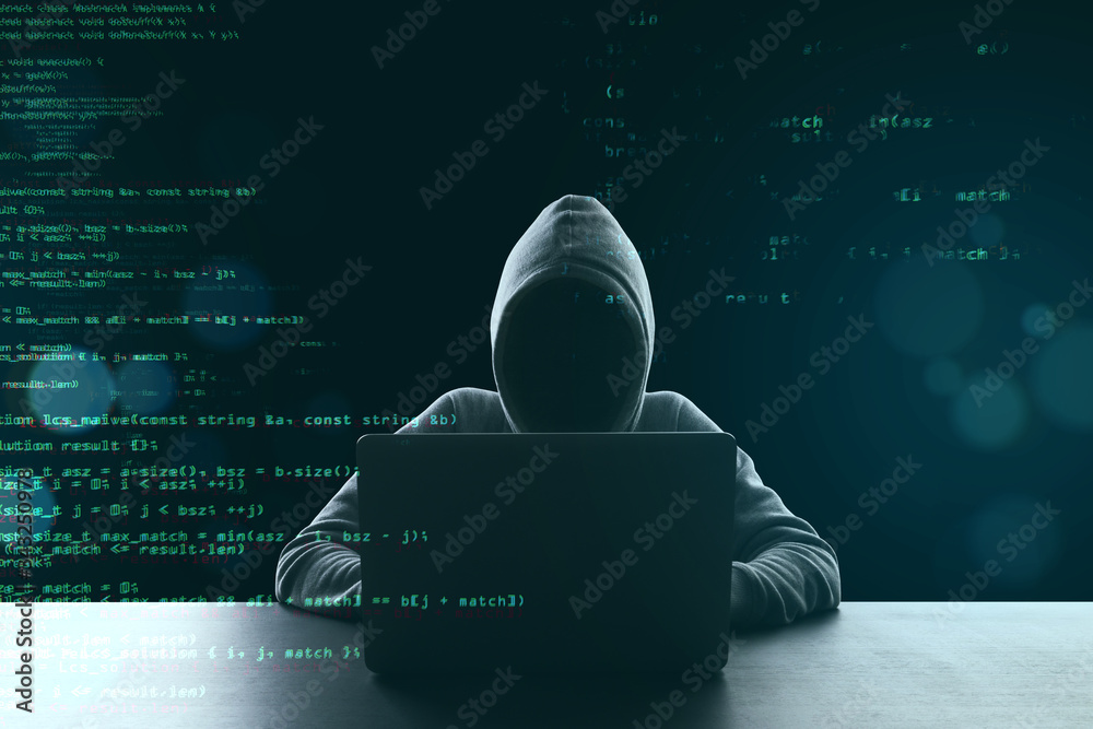 Fototapete Hacker using laptop computer with html code