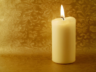 Holiday candle with elegant background and copy space