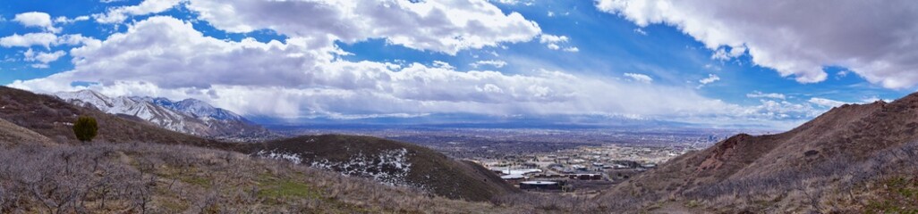Salt Lake Valley and City panoramic views from the Red Butte Trail to the Living Room, Wasatch Front, Rocky Mountains in Utah early spring. Hiking view of trails around the University and Gardens and 