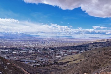 Salt Lake Valley and City panoramic views from the Red Butte Trail to the Living Room, Wasatch Front, Rocky Mountains in Utah early spring. Hiking view of trails around the University and Gardens and 