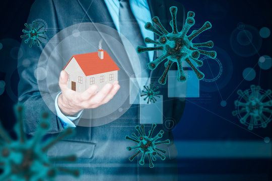 Businessman protecting his quarantined house by Coronavirus. Virus protection concept. Covid-19 - Powered by Adobe