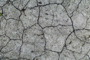 Cobblestone texture.Marble and granite drainage system closeup.Concrete wall with gravel. Gray foundation of the house.