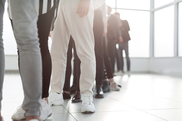 close up. group of young professionals standing in line