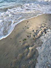 sea ​​with sand at sunset