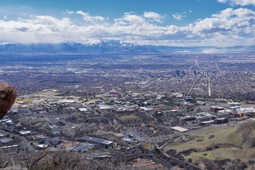 Salt Lake Valley and City panoramic views from the Red Butte Trail to the Living Room, Wasatch Front, Rocky Mountains in Utah early spring. Hiking view of trails around the University and Gardens and 