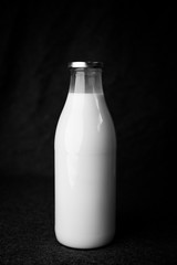 bottle of milk and glass