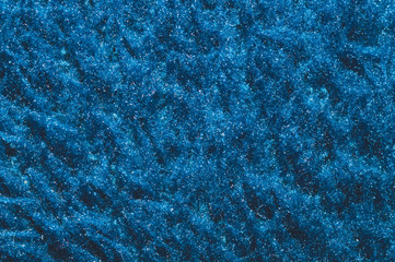 Soft fabric texture. blue textile with curly fibers. wool background