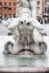 Fototapeta na wymiar Fontana del Moro, or Moor Fountain, on Piazza Navona, Rome, Italy. Detailed view of sculptures