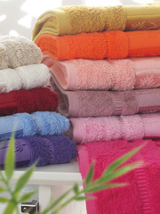 Fototapeta na wymiar Stack of clean soft colorful towels. 