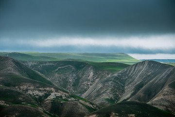 Beautiful sunset view at mountains in Azerbaijan. Cloudy weather.
