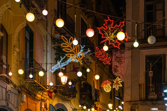A typical street of Salerno illuminated with lights during Christmas holidays, Campania, Italy