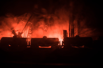 Train moving in fog. Ancient steam locomotive in night. Night train moving on railroad. orange fire background. Horror mystical scene