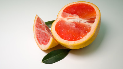 Fototapeta na wymiar juicy grapefruit on a white background