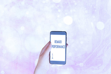 Writing note showing Reward Performance. Business concept for Appraisal Recognize workers Relative...