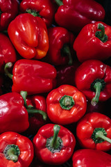 Mock up of red bell pepper for sale in a greengrocery. Background can be used for greengrocer.