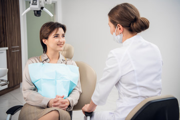 Fototapeta premium Dentistry visit, preventive medical annual check up. Positive facial expression