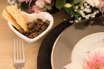 eggplant caponata with cornice on elegant table