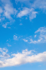 Naklejka na ściany i meble high blue summer sky. the wind accelerates small clouds. weather improvement concept