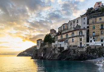 Fototapeta na wymiar The typical village of Minori overlooking the Tyrrhenian sea at sunset, Amalfi Coast, Campania, Italy