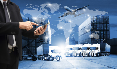 Double exposure of man with world map for logistic network distribution on background and Logistics...