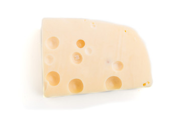 Piece of yellow cheese isolated on white background. Top view.