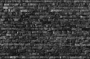 Seamless texture of a black brickwall.