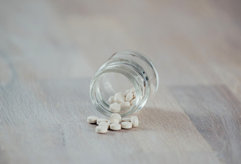 pills in glass jar