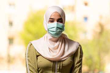 Muslim Prayer Woman Wearing Protective Mask and Gloves