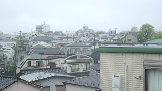 Heavy Rain Pouring Down In The Neighborhood In Tokyo, Japan On A Stormy Weather - Wide Shot