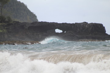 waves breaking on rocks