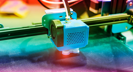 3D printer or additive manufacturing and robotic automation technology.