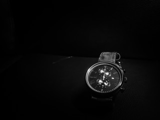 Black and white photo of luxury clock for men