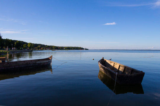 Boats Moored On River Against Clear Sky © viktoras sestakauskas/EyeEm